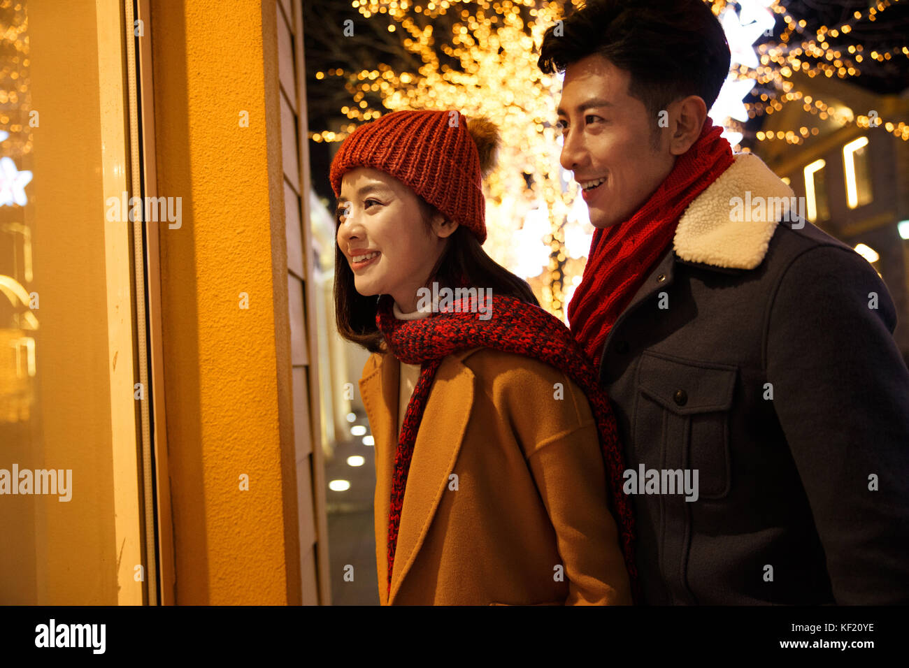 Happy couples shopping Stock Photo Alamy