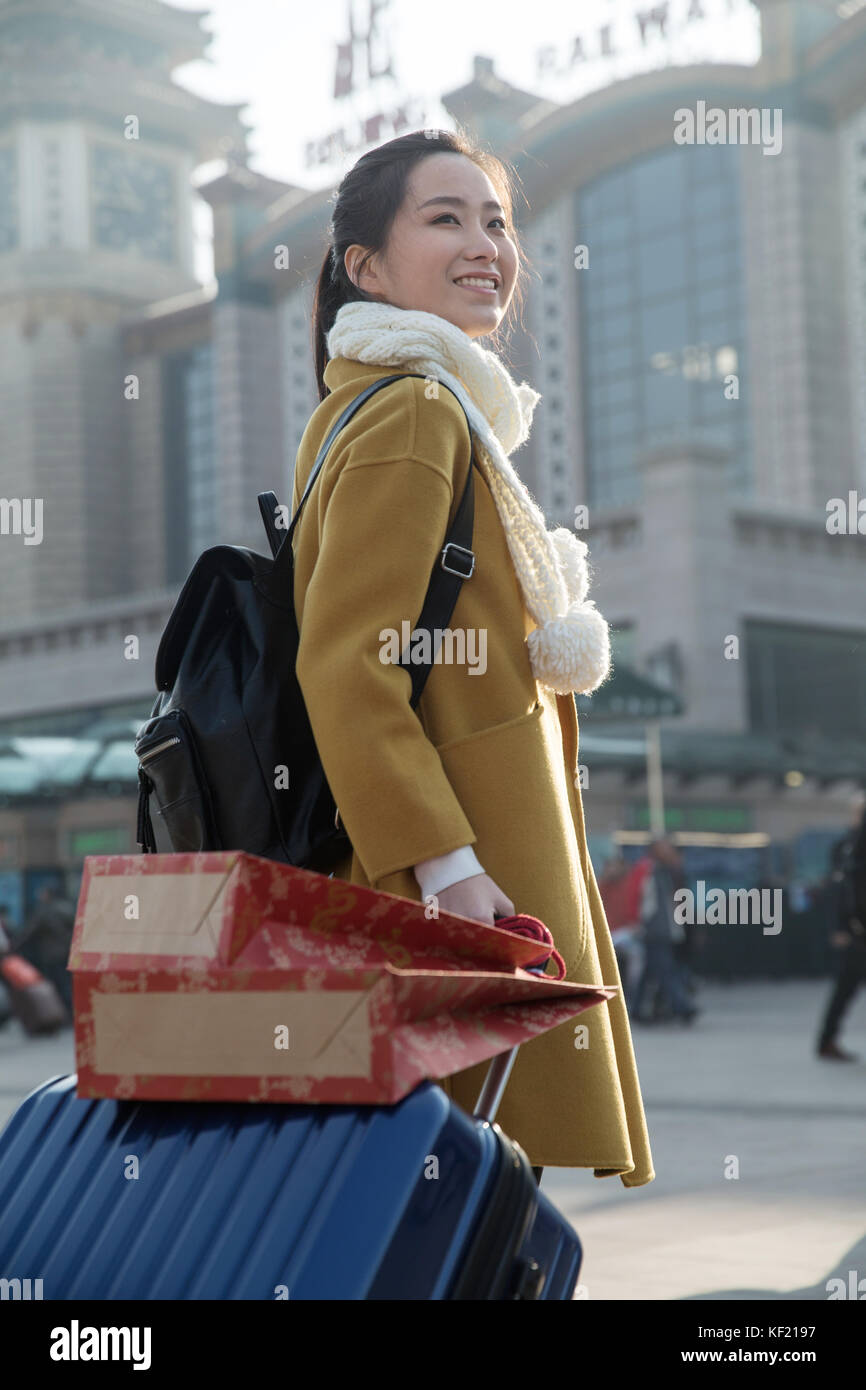 Young women at the railway station Stock Photo - Alamy