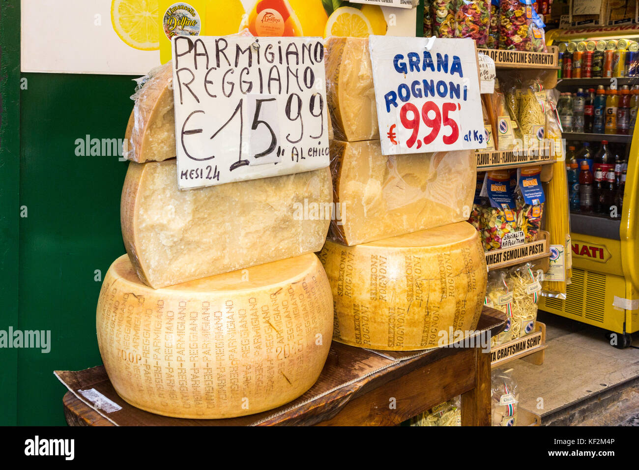 Rounds of cheeses for sale outside a shop in Naples, Italy Stock Photo