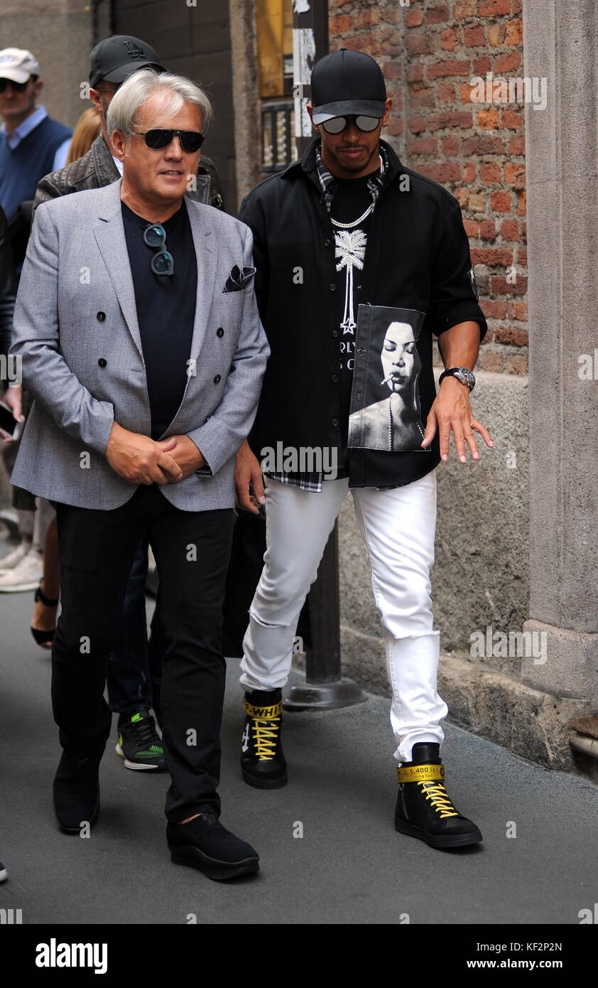 Lewis Hamilton leaves Giuseppe Zanotti's boutique wearing a pair of Stock  Photo - Alamy