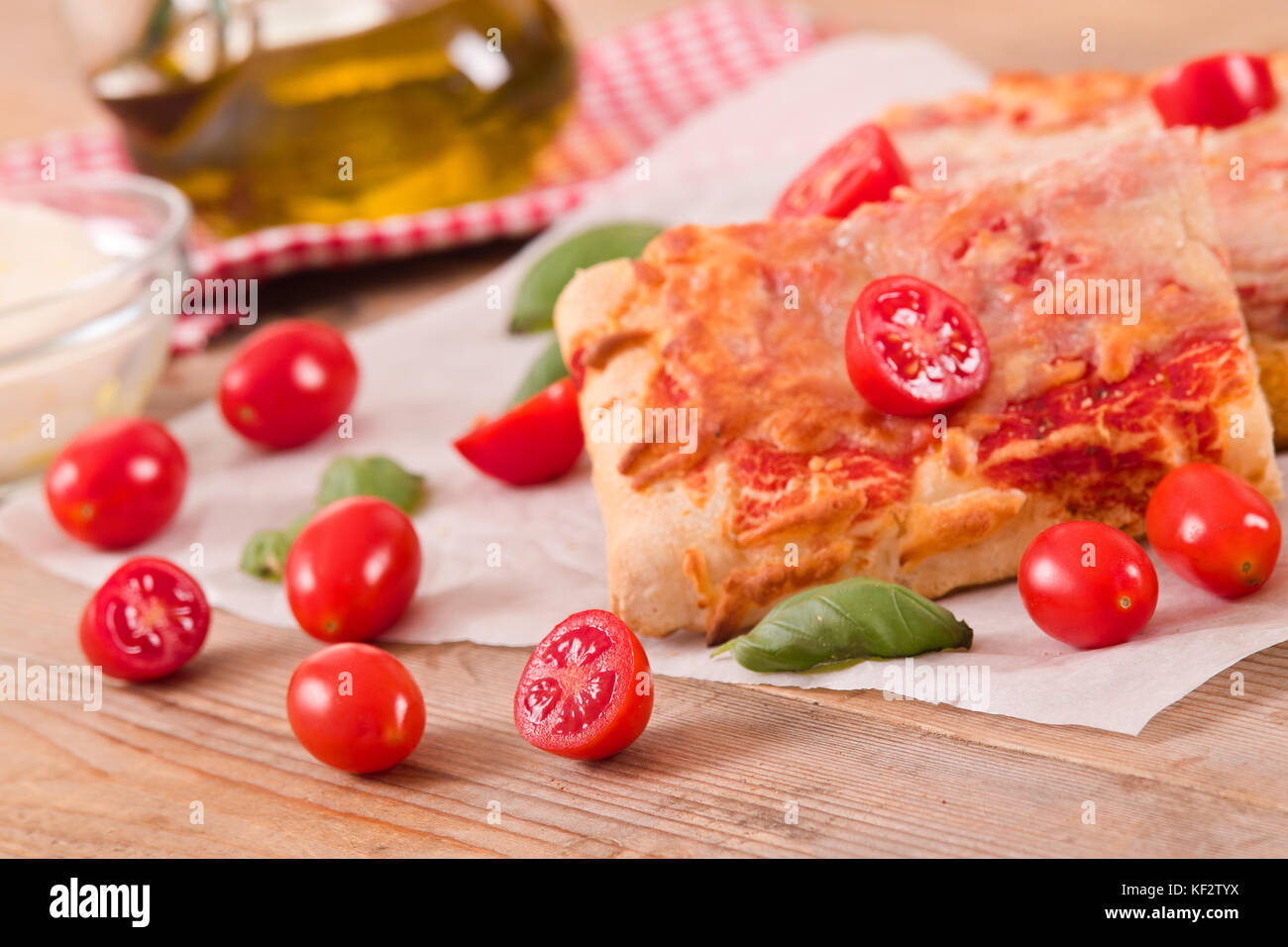 Italian pizza with cheese, tomatoes and fresh basil Stock Photo Alamy