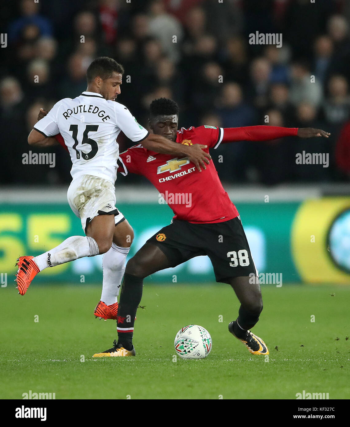 Wayne Routleg Swansea City's Wayne Routledge (left) and Manchester United's Axel ...