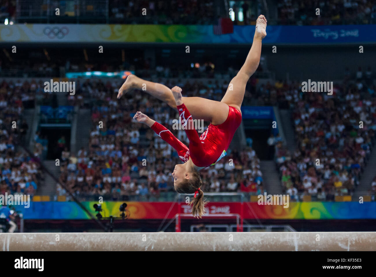 Shawn Johnson (USA) competing on the balance beam in the Women Team