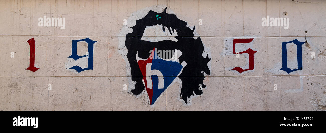 Wall art on a street in Split of Torcida Split, the HNK Hajduk Split supporters group which was created in 1950 - the same season where they were unbe Stock Photo