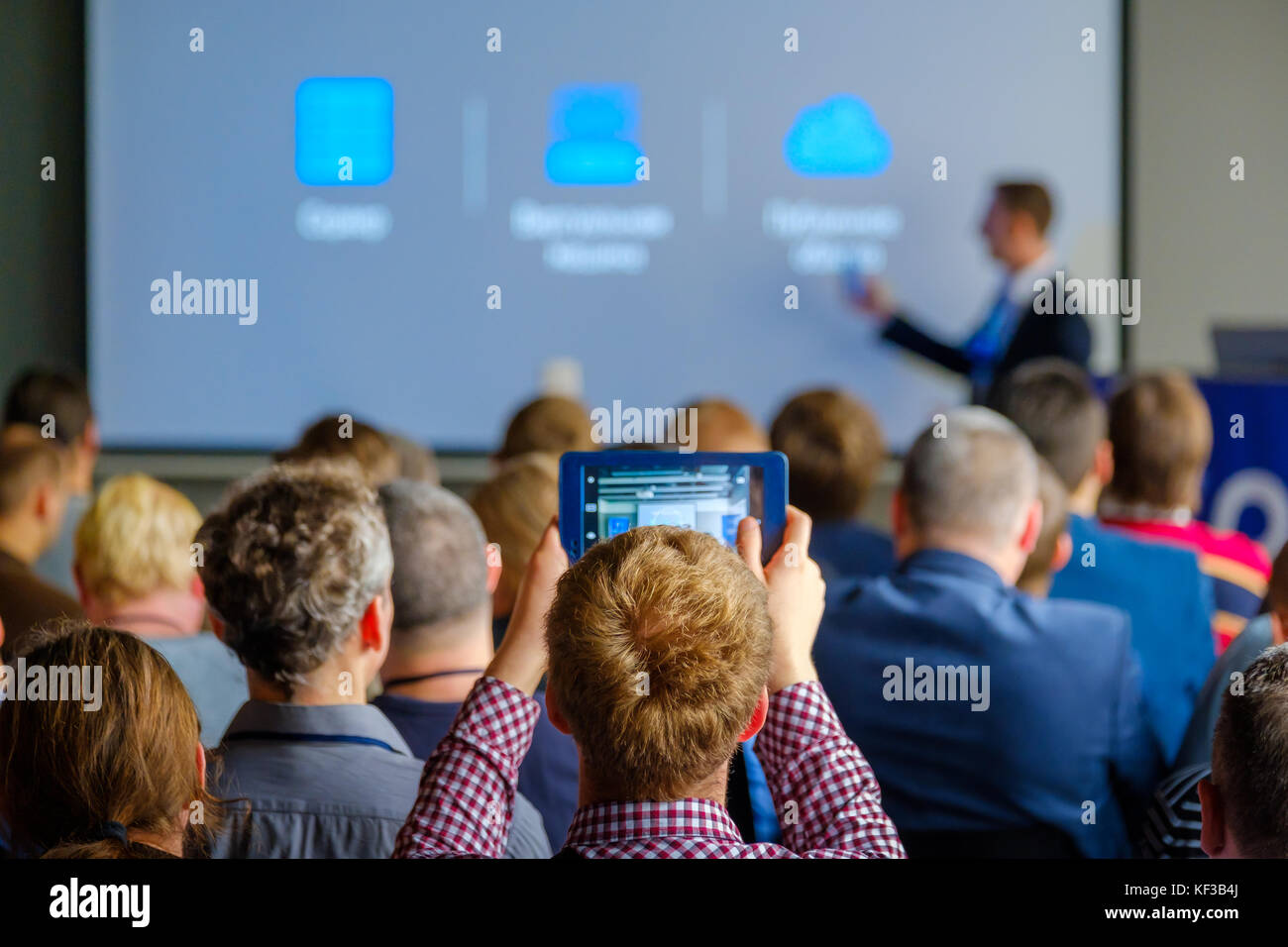 Audience listens to the lecturer Stock Photo - Alamy