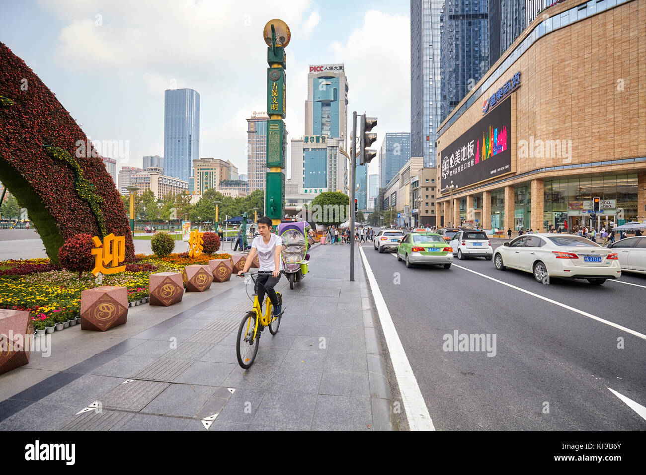 Chengdu, China - September 29, 2017: Busy street in downtown Chengdu, one of the three most populous cities in Western China. Stock Photo