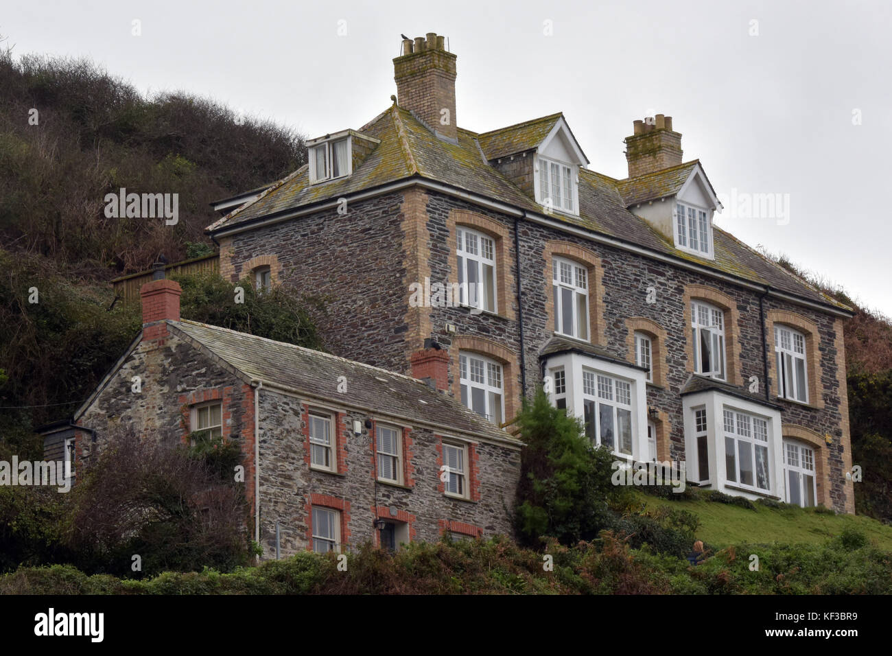 Some Stone Built Cornish Cottages And Houses On A Hill Near The