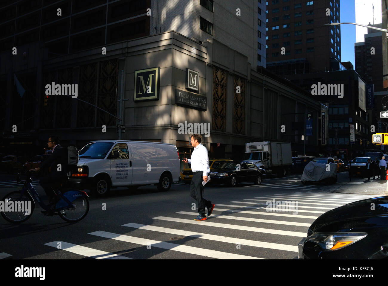 Man in front of the Manhattan Hotel, New York City Stock Photo