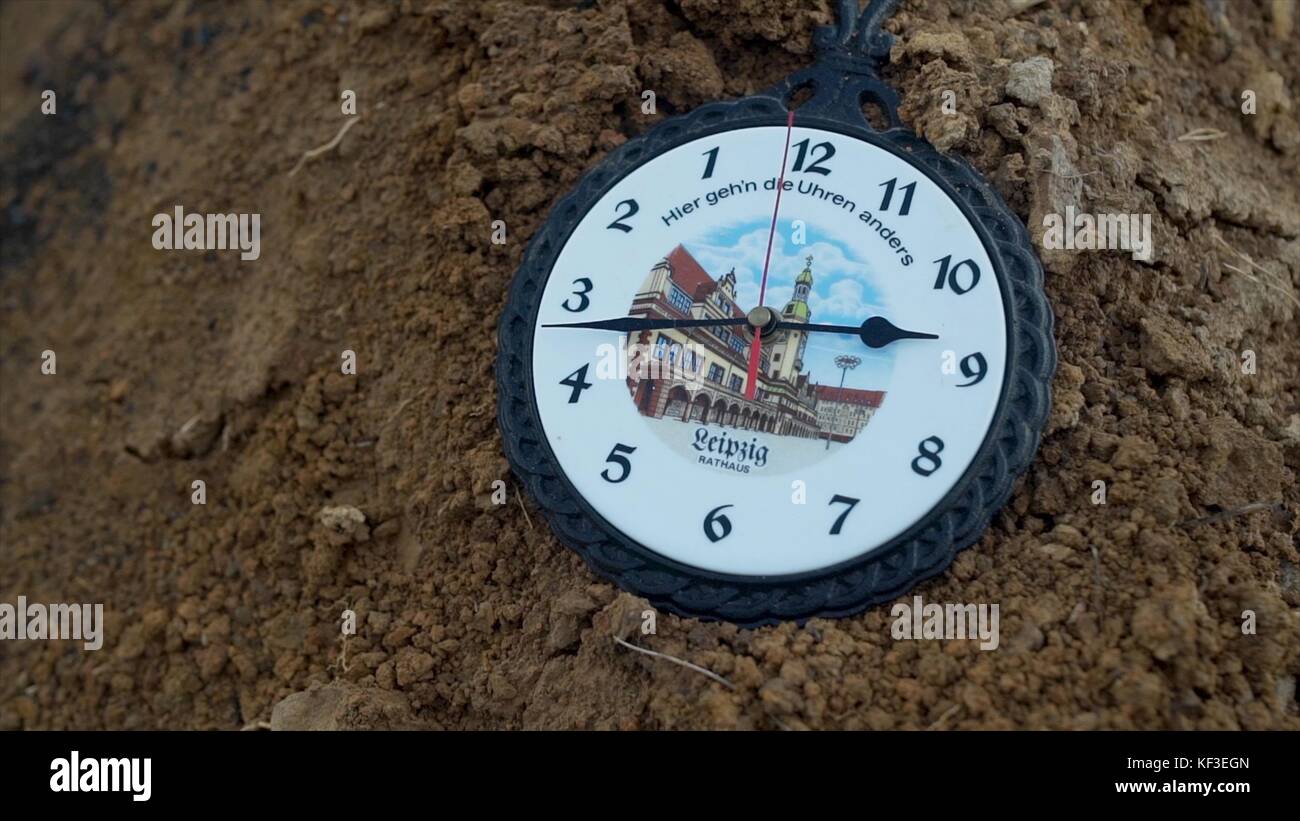 Wall clock wall clocks go back. Footage. Wall clock go backwards. Vintage wall clock lying on