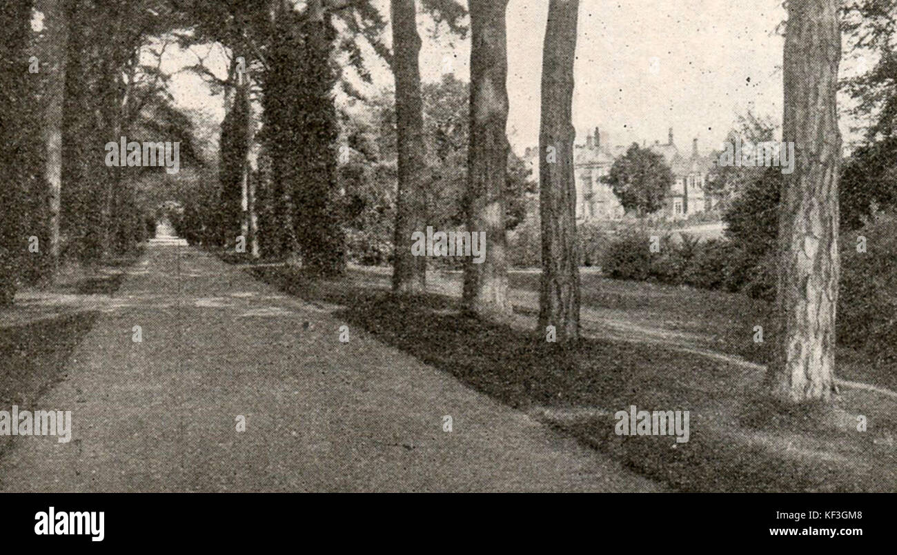 Church Walk with the British Royal residence   Sandringham House in the background , Norfolk in 1932 Stock Photo