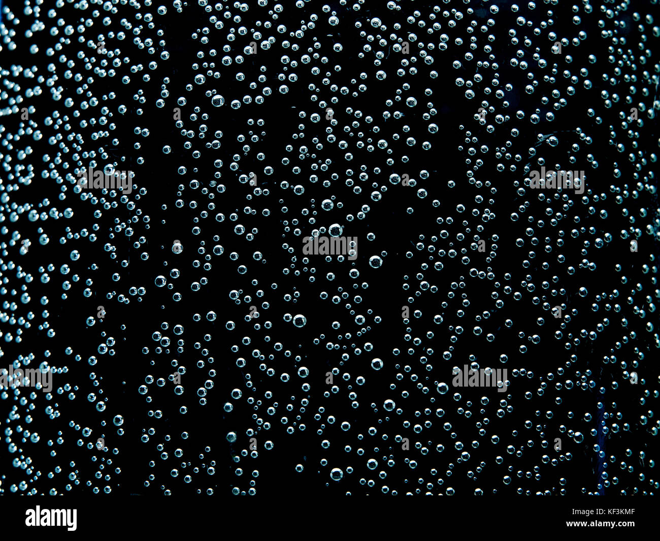 Bubbles in water, rain drops on glass, abstract background Stock Photo Alamy