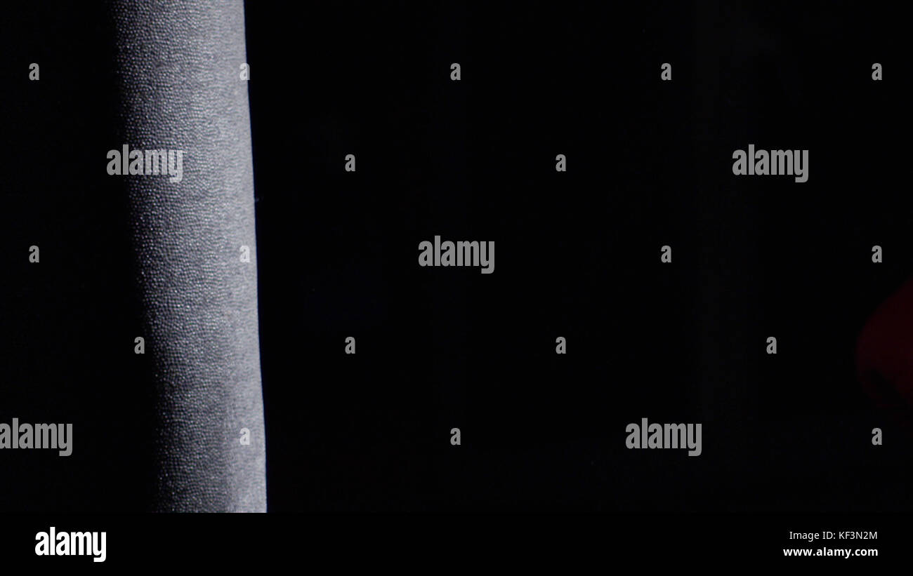 Fighter Practicing Some Kicks With Punching Bag A Man With A Tattoo