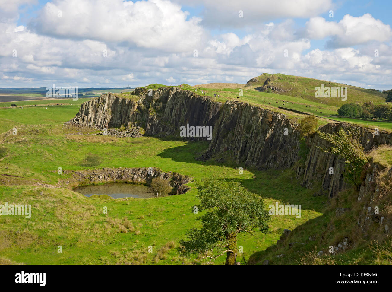 View looking east along Walltown Crags section of Roman Hadrians Wall in summer Northumberland England UK United Kingdom GB Great Britain Stock Photo