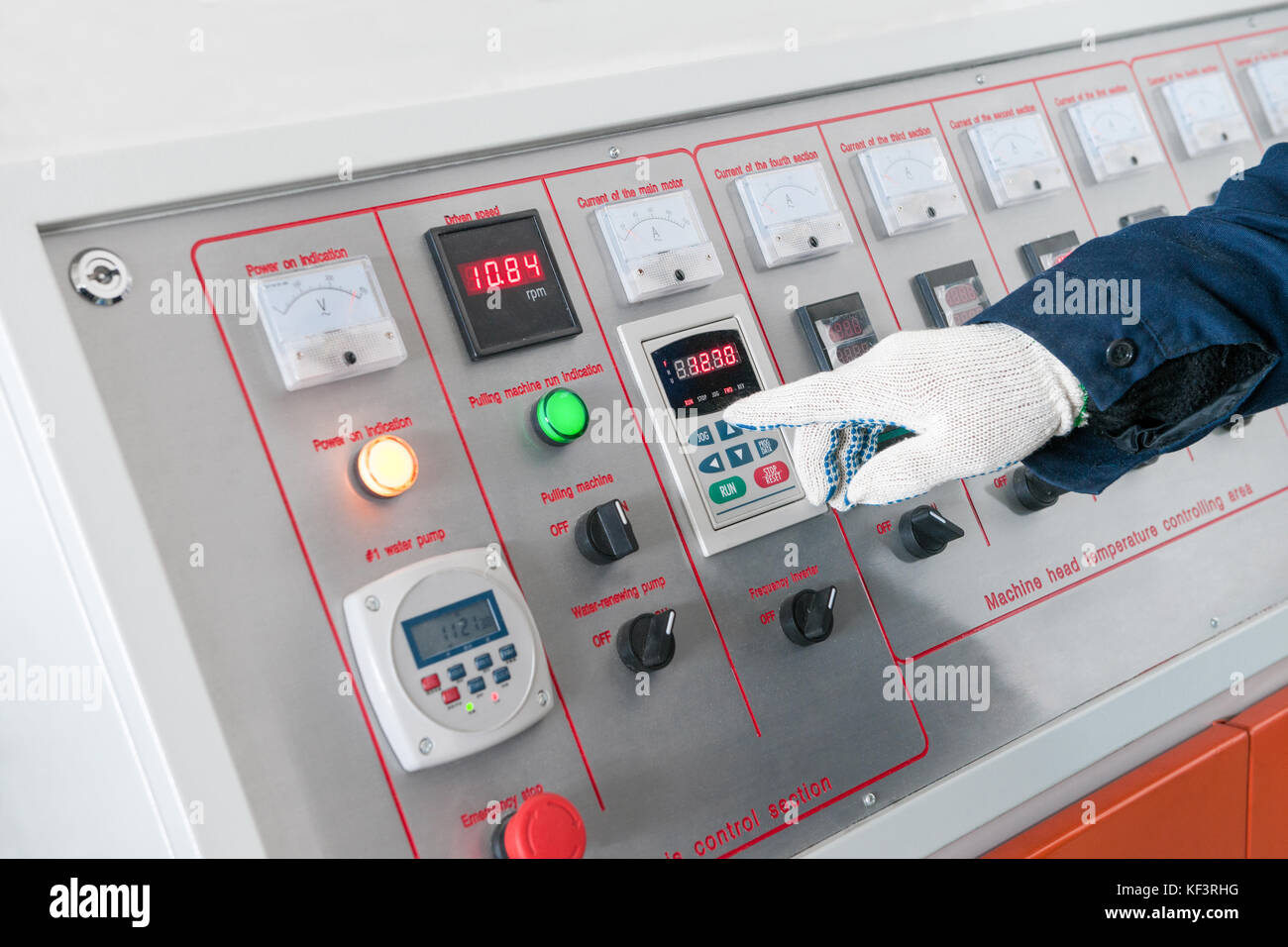 closeup of the working hand on the remote machine control. worker ...