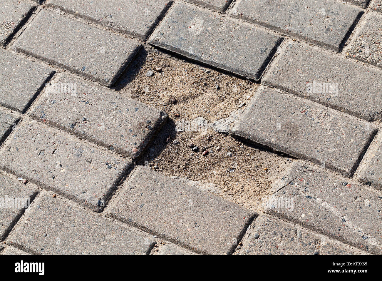pedestrian tiles broken Stock Photo Alamy