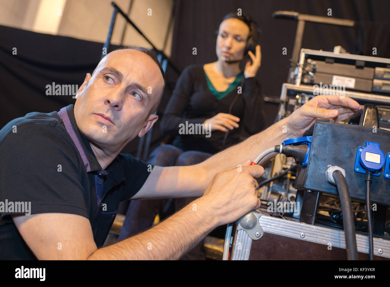 sound engineer working at mixing panel in recording studio Stock Photo ...