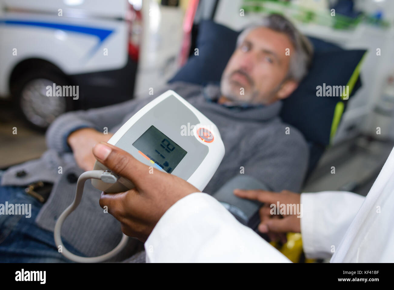 Blood pressure man ethnic hi-res stock photography and images - Alamy