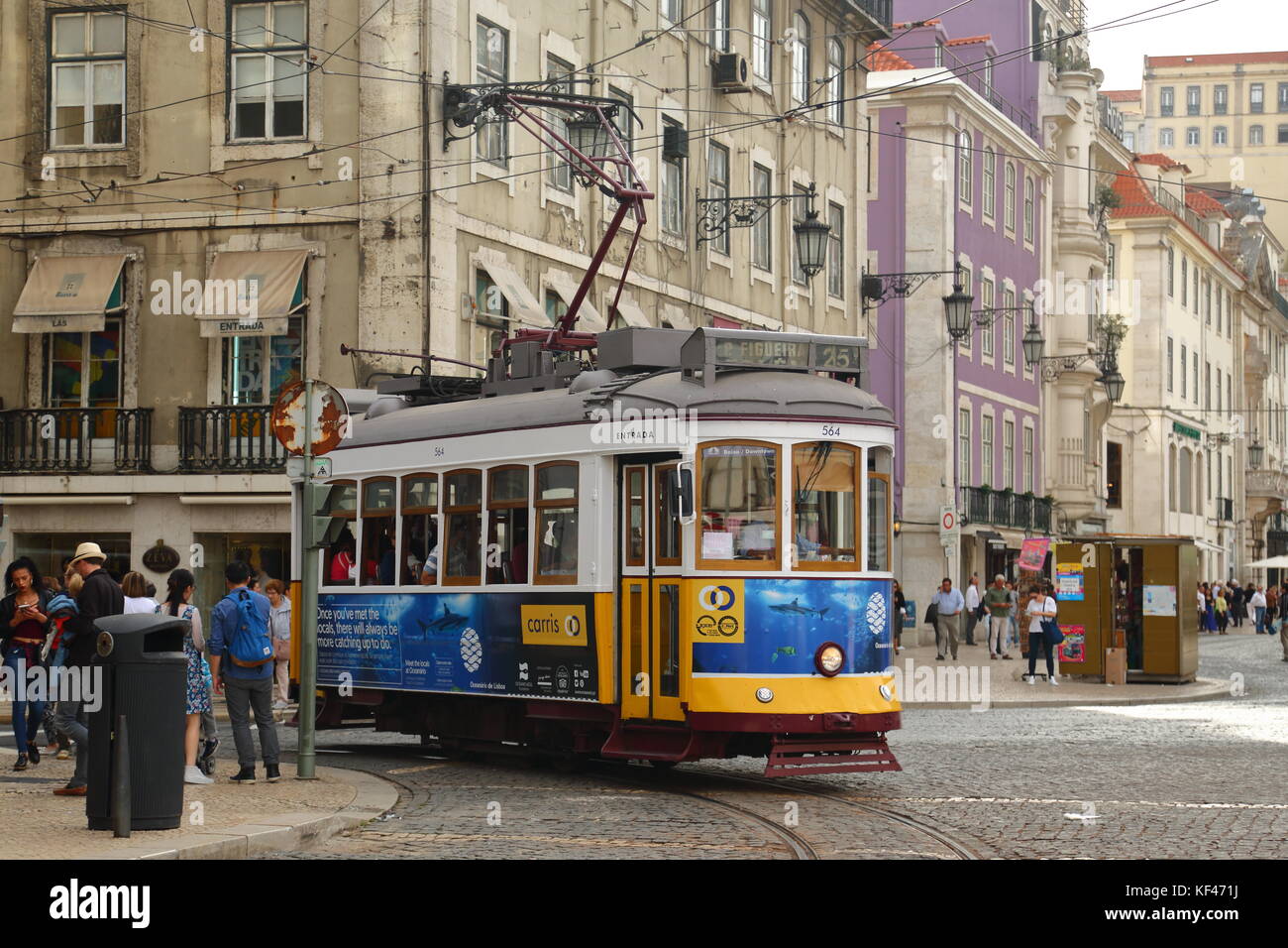 The old trams still form part of Lisbon's day to day transport system Stock Photo