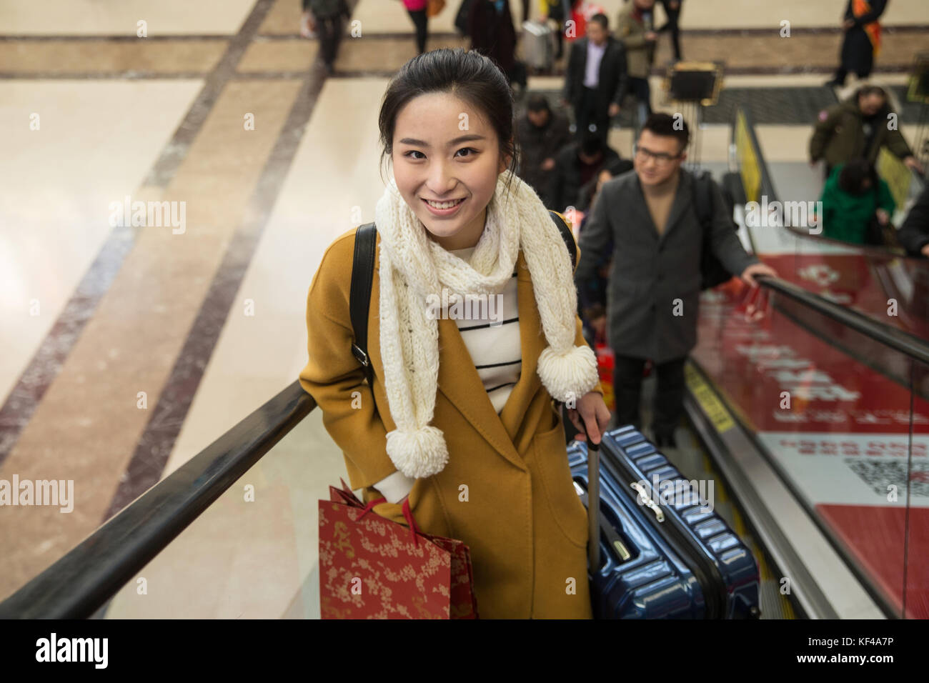 Young women at the railway station Stock Photo - Alamy