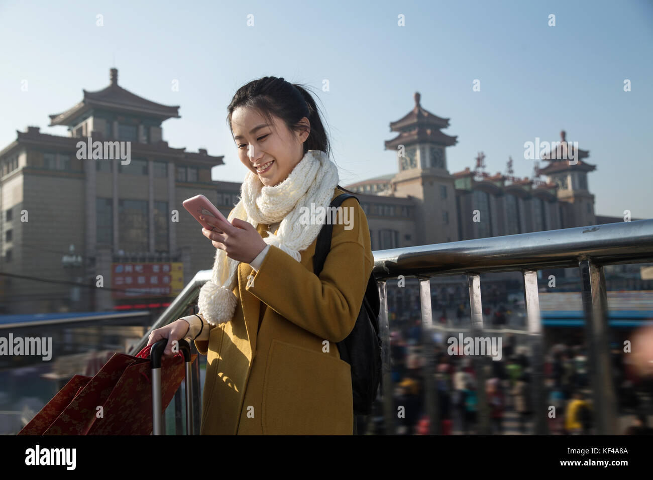 Young women at the railway station Stock Photo - Alamy