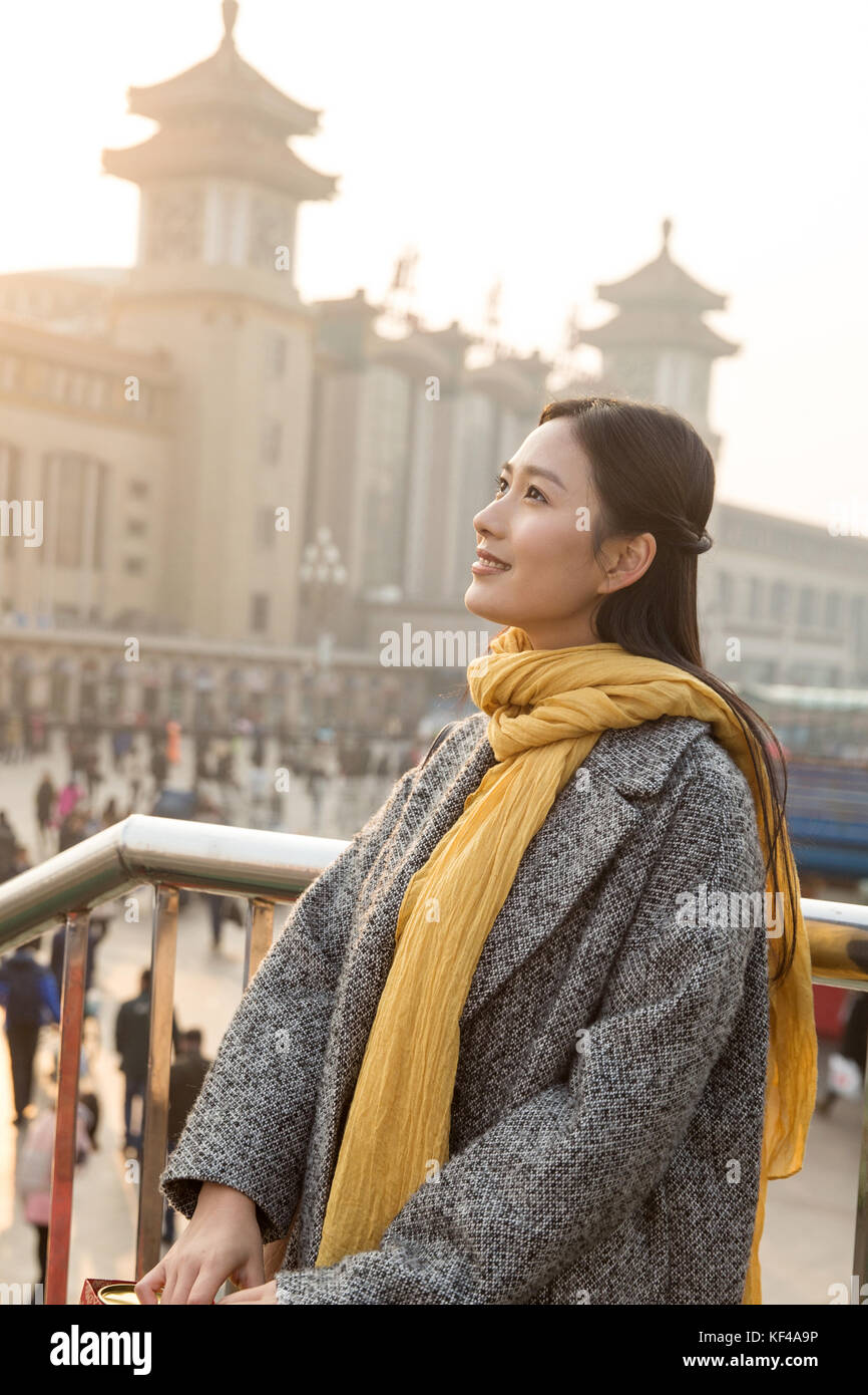 Young women at the railway station Stock Photo - Alamy