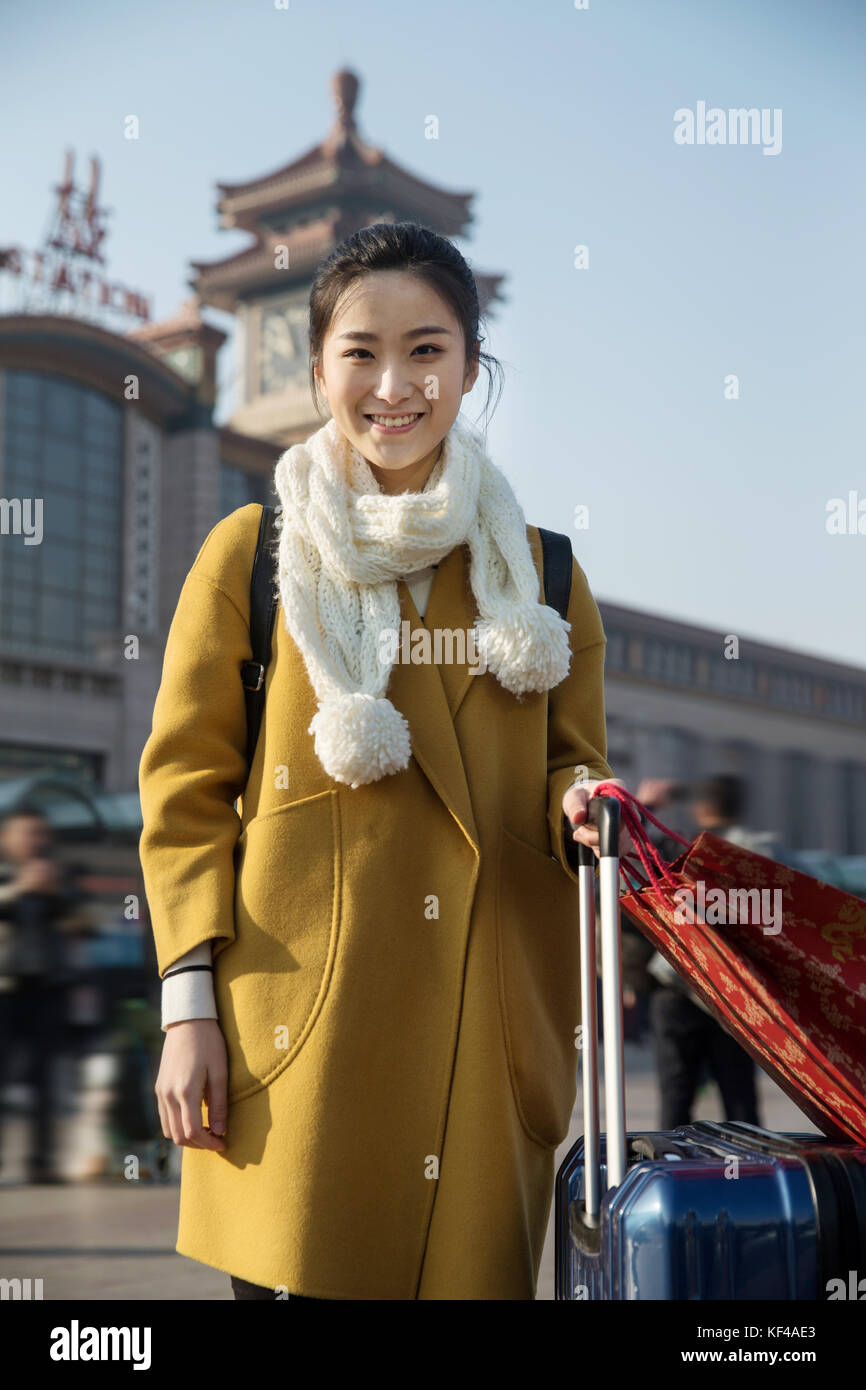 Young women at the railway station Stock Photo - Alamy