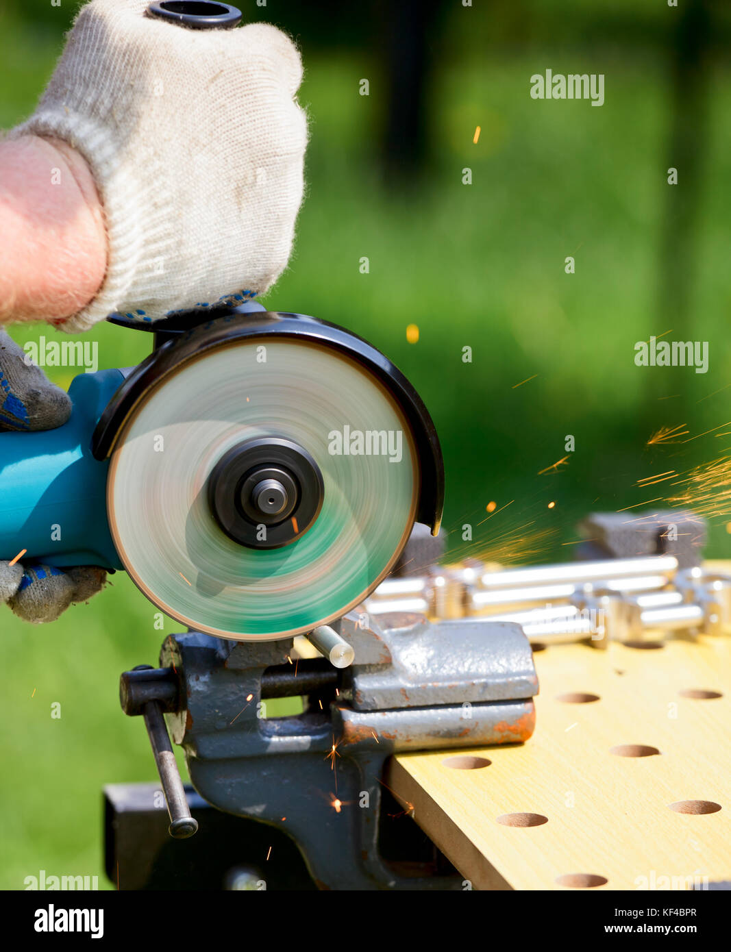 Man cutting metal with angle grinder Stock Photo Alamy