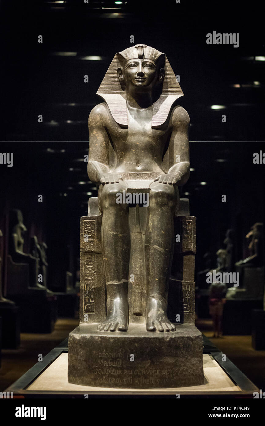Turin. Italy. Statue of Egyptian Pharaoh Tuthmosis III seated on a throne. New Kingdom, 18th Dynasty (1479-1425 B.C) Museo Egizio (Egyptian Museum).   Stock Photo