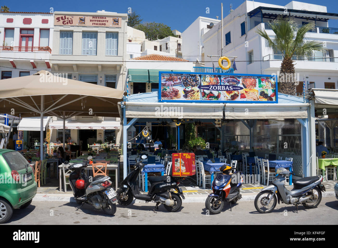 Fish restaurant at the harbour promenade of Naxos-town, Naxos, Cyclades, Aegean, Greece Stock Photo