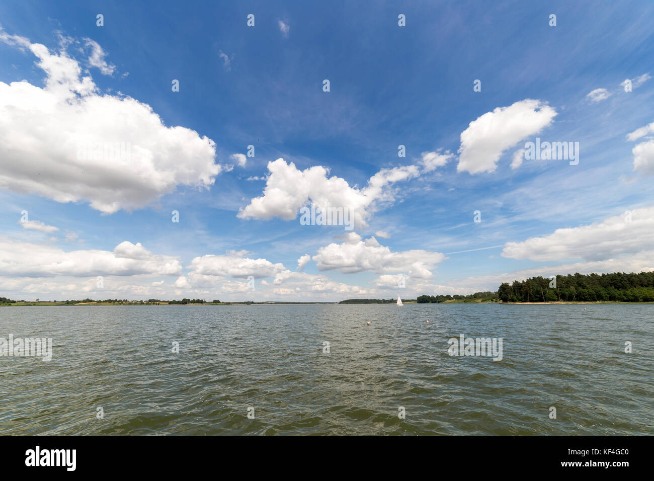 Landscape with lake in summer. Blue sky Stock Photo - Alamy