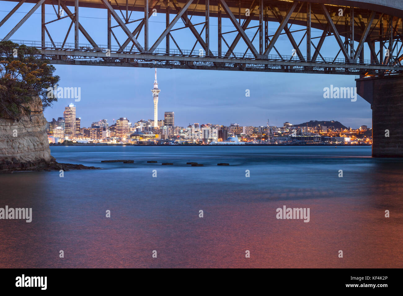Auckland Skyline and Harbour Bridge at twilight from Northcote Point. Stock Photo