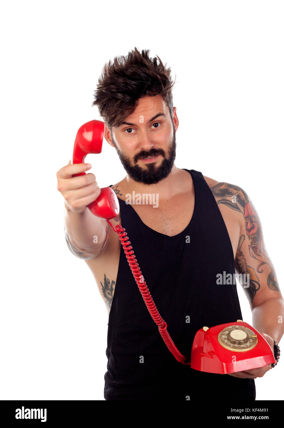 Man Using Red Telephone Attractive guy with a old red phone isolated on a white background ...