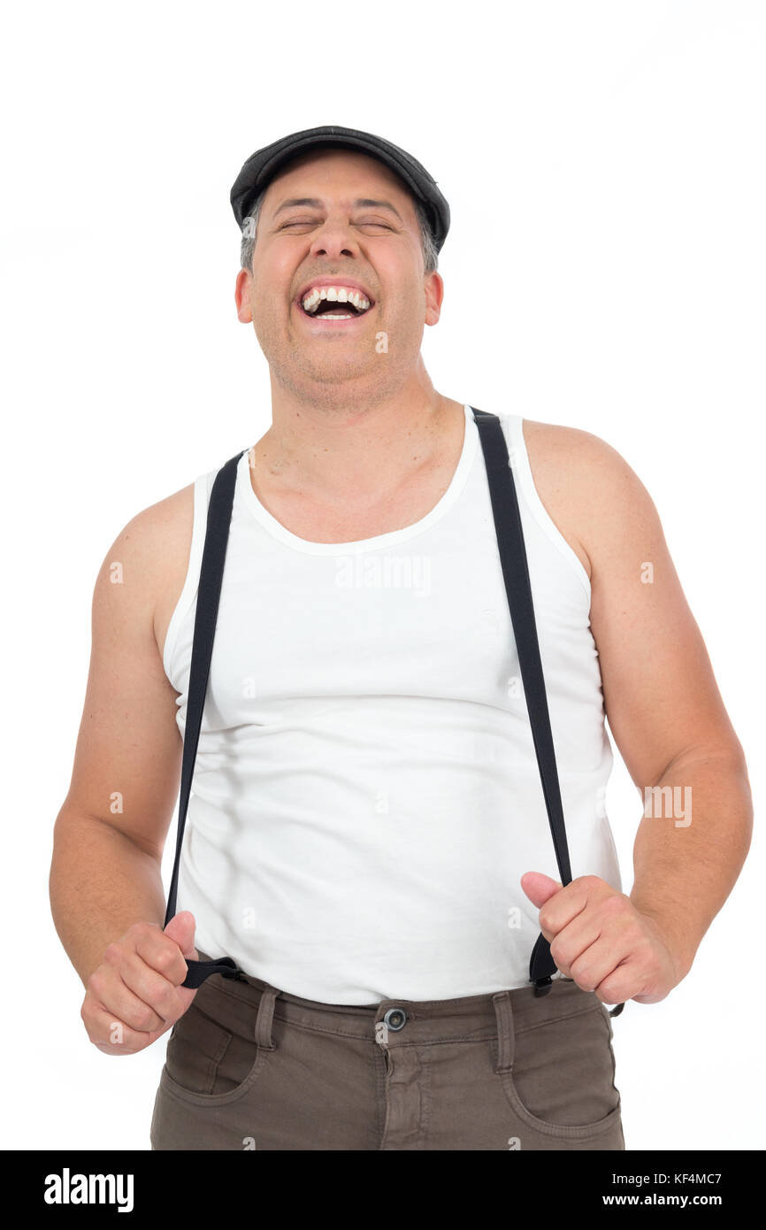 Fat man holds the pants suspender. He is smiling. Vintage and retro. Clothes of old. The old fashion. Isolated on white background. Laughing Stock Photo