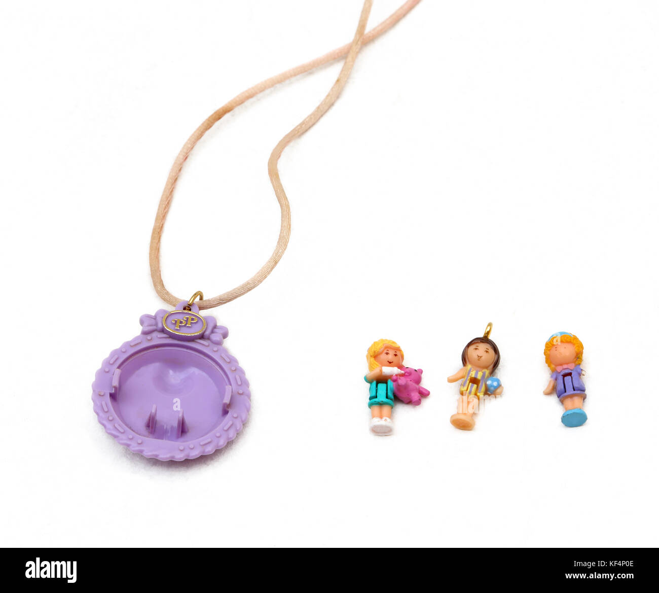 Vintage 1990's Toys Polly Pocket Dolls and necklace Stock Photo