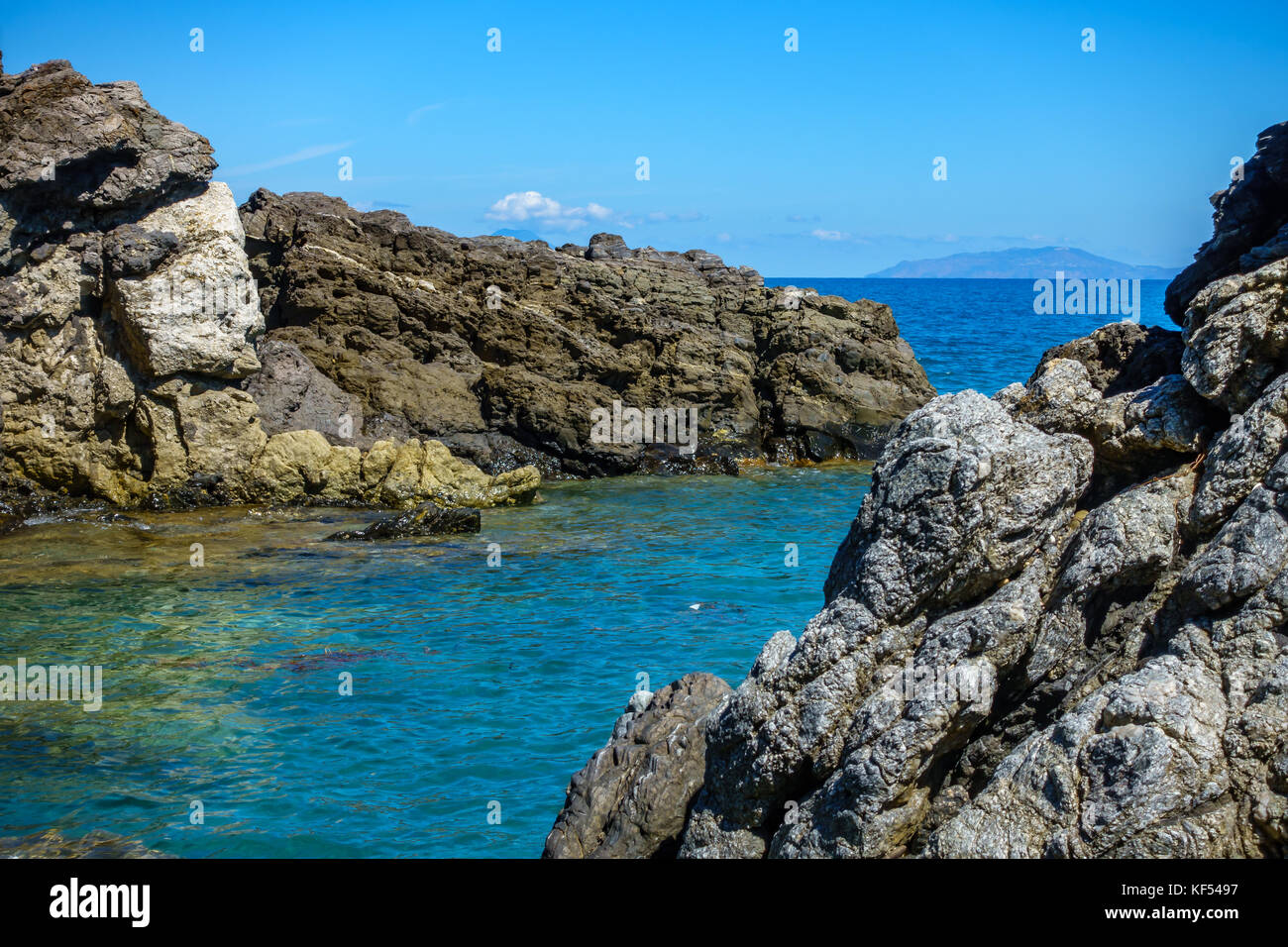 Beach at Capo D'orlando Sicily with rocks Stock Photo - Alamy