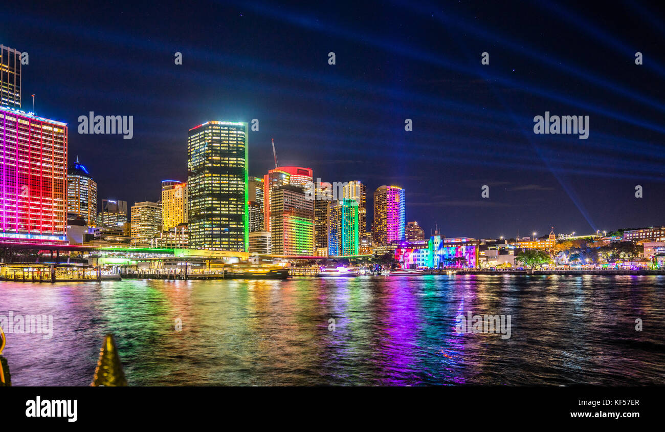Australia, New South Wales, Sydney, Circular Quayat night with the colouful illuminated CBD skyline during Vivid Light 2017 Stock Photo