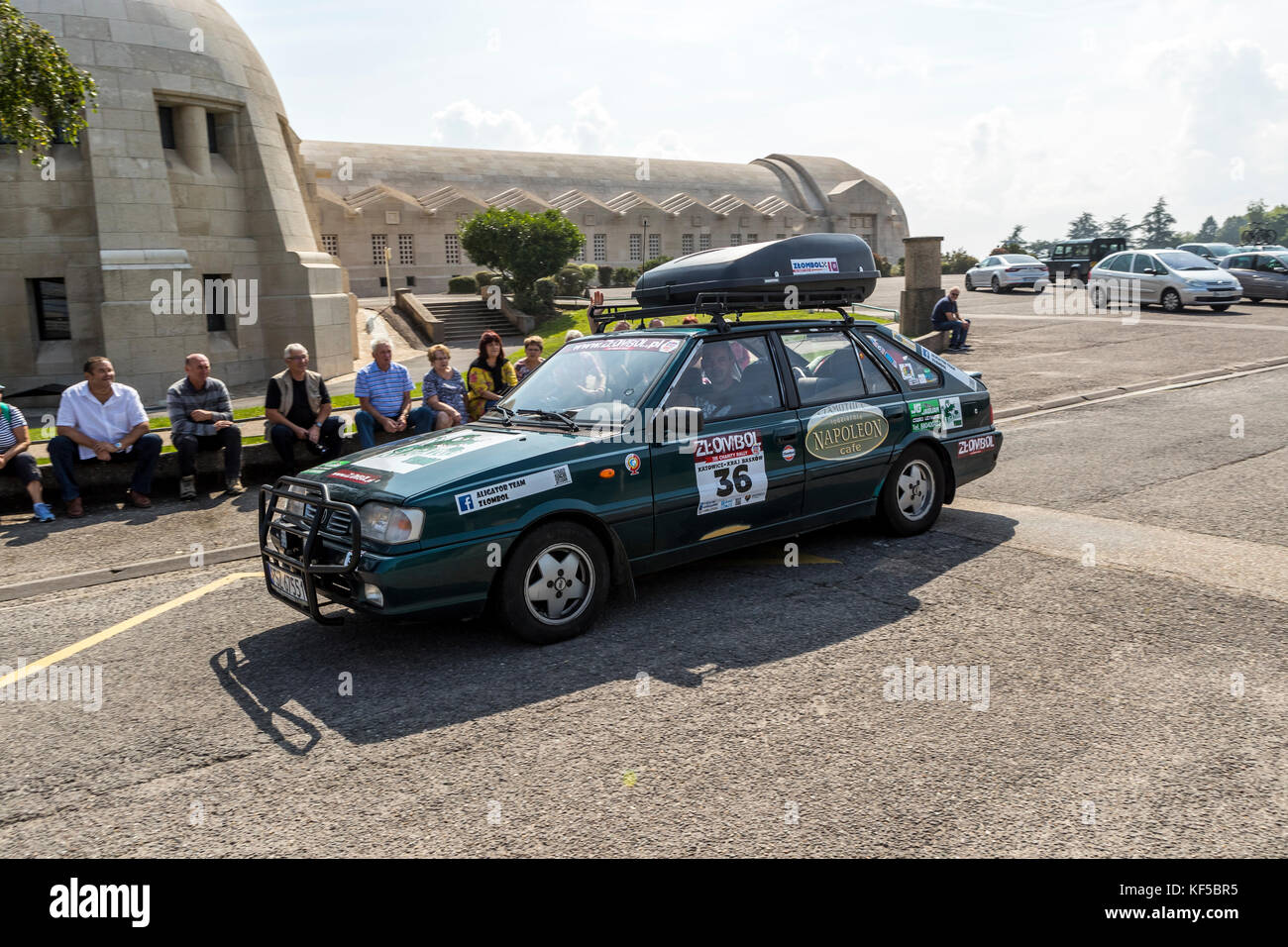 Cars on a rally. The Douaumont ossuary, national cemetery and memorial site, including Trench du Bayonette, France. Stock Photo