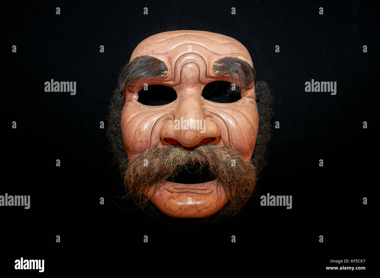 Pendeta mask made using real human facial hair. Setia Darma House of Masks and Puppets, Mas, Ubud, Bali, Indonesia. Stock Photo