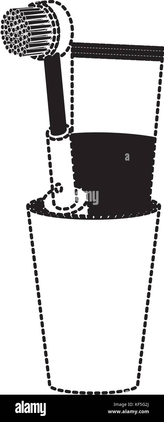 glass with toothpaste and electric toothbrush in black dotted ...