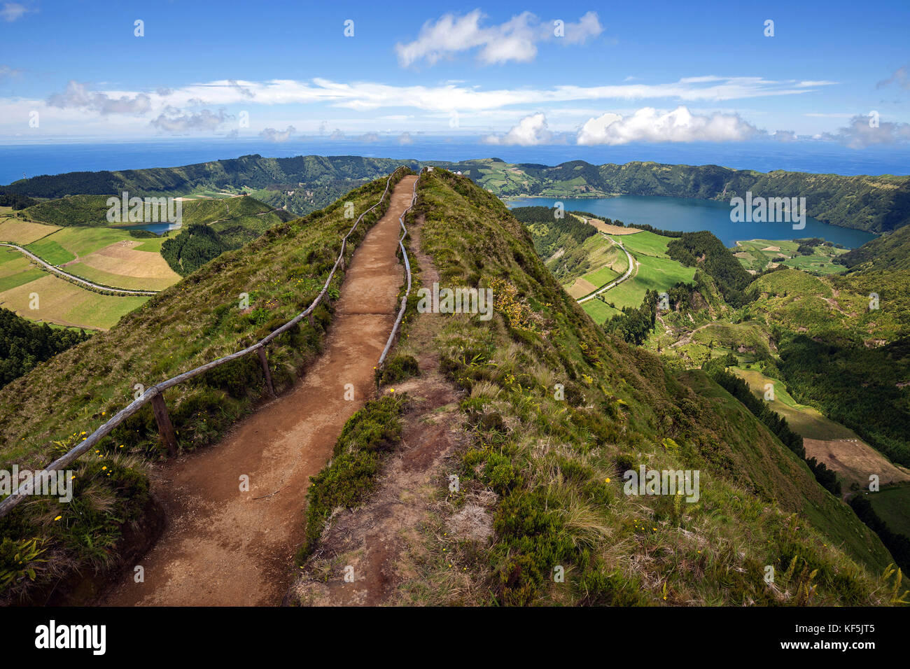 Way to a viewpoint in the volcanic crater Caldera Sete Cidades, at the back on the right crater lakes Lagoa Azul Stock Photo