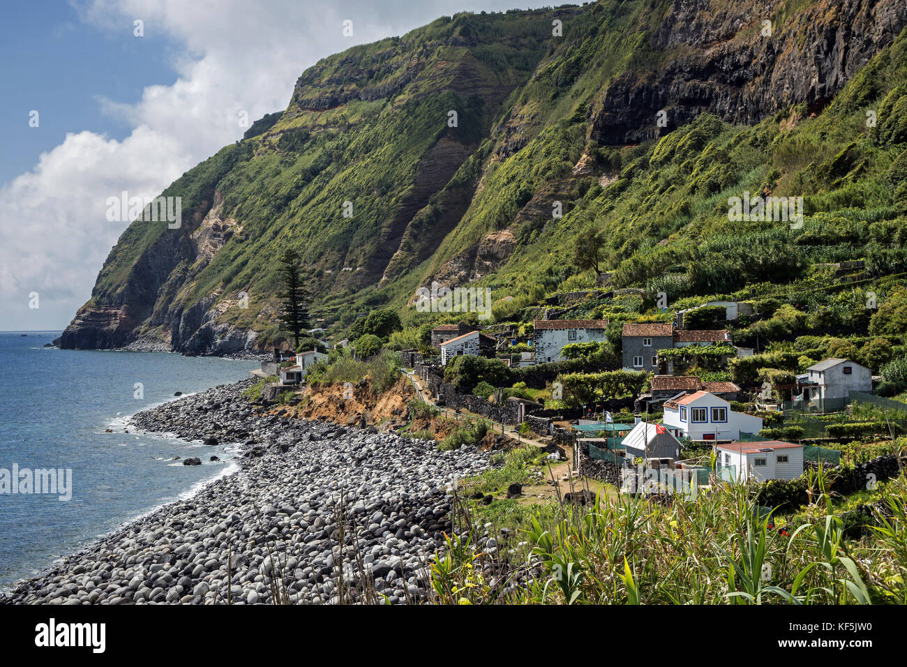 View of cliffs and settlement Rocha da Relva, southwest coast, island of Sao Miguel, Azores, Portugal Stock Photo