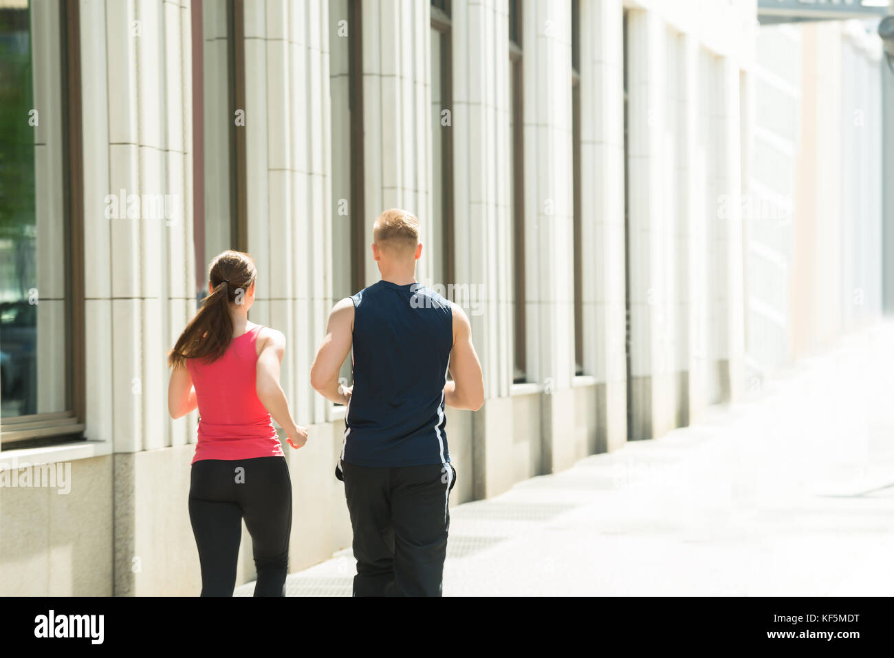 Yoga instructor female man hi-res stock photography and images