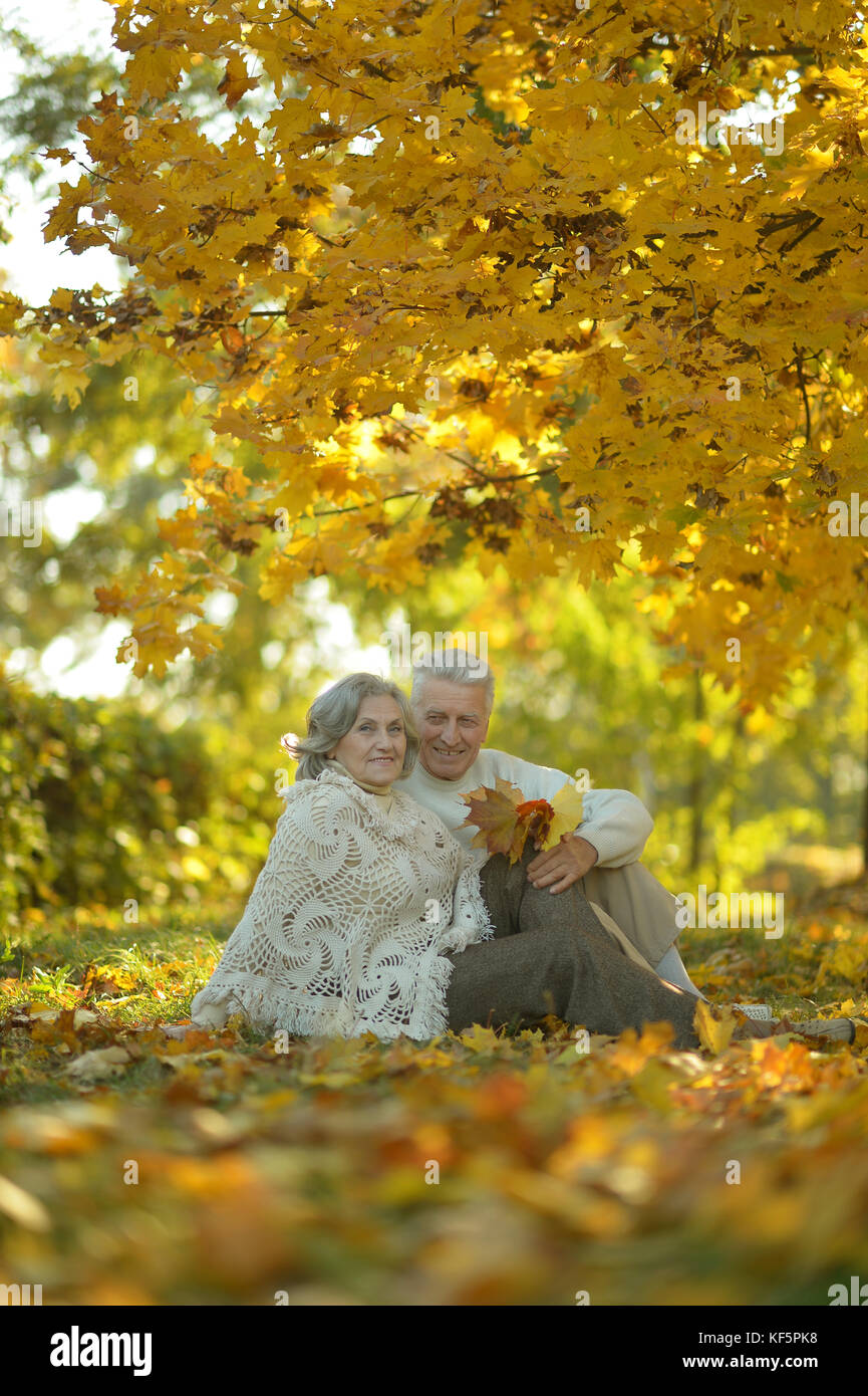 Senior couple relaxing in park Stock Photo - Alamy