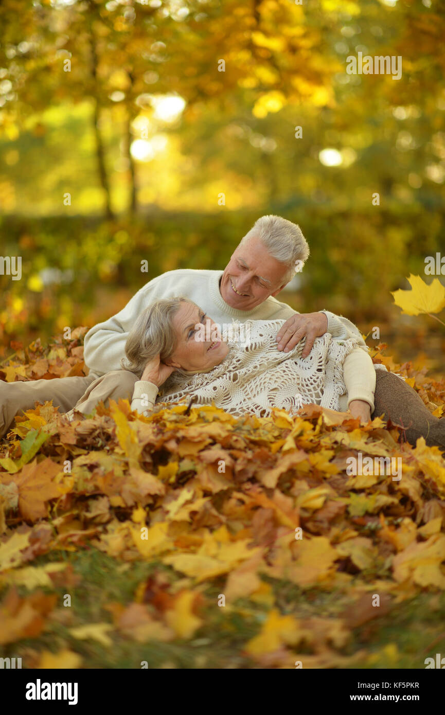 Senior couple relaxing in park Stock Photo - Alamy
