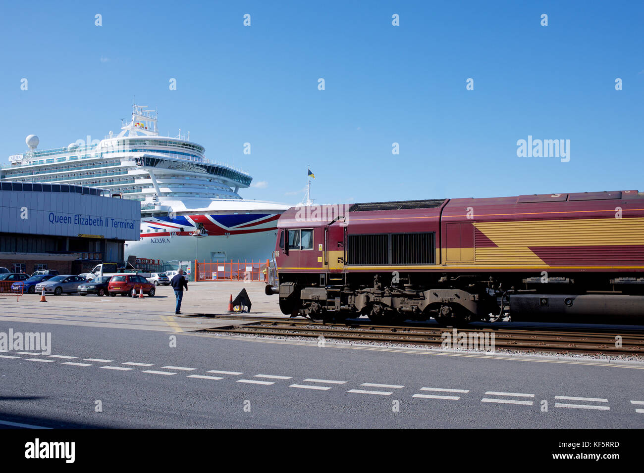 Class 66 locomotive at Southampton Docks with a cruise liner in the background Stock Photo