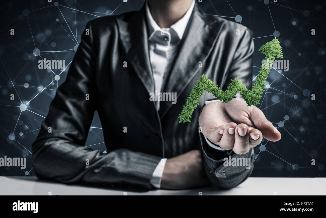 Businessman presenting growing graph Stock Photo - Alamy