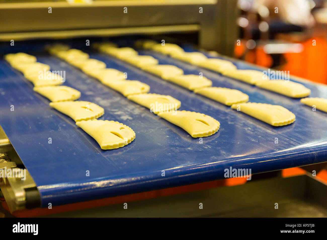 Professional bakery equipment, pastry conveyor Stock Photo Alamy