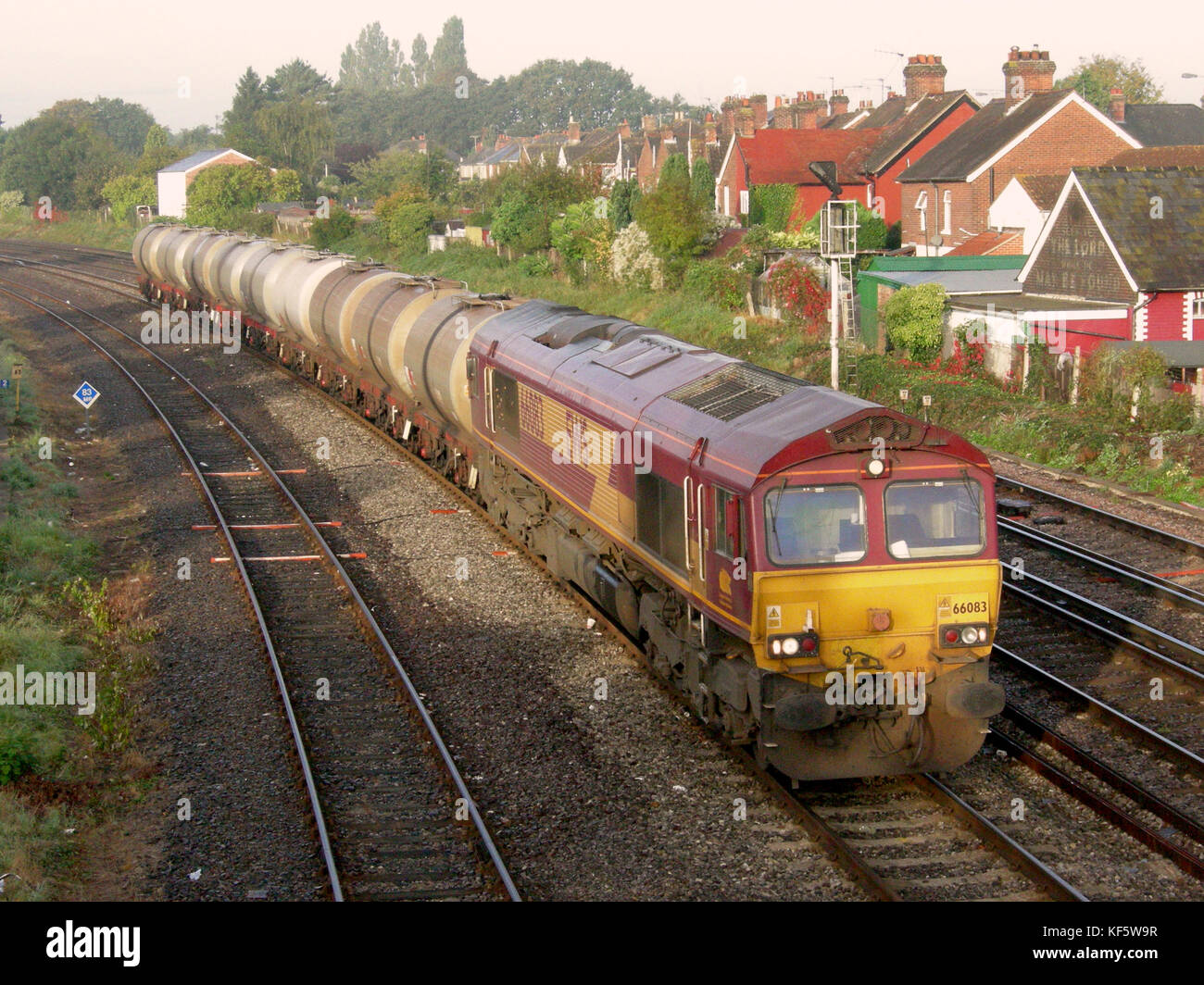 Class 66 on a short freight train at Totton, England Stock
