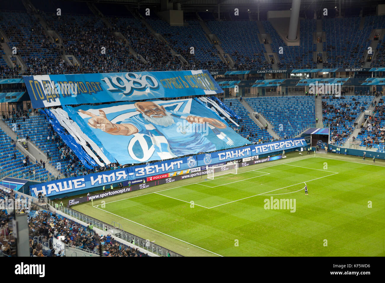 SAINT-PETERSBURG, RUSSIA-CIRCA OKT, 2017: Large banner is unfolded over Zenit fans sector. Russian Championship football match between Zenit and Dinam Stock Photo