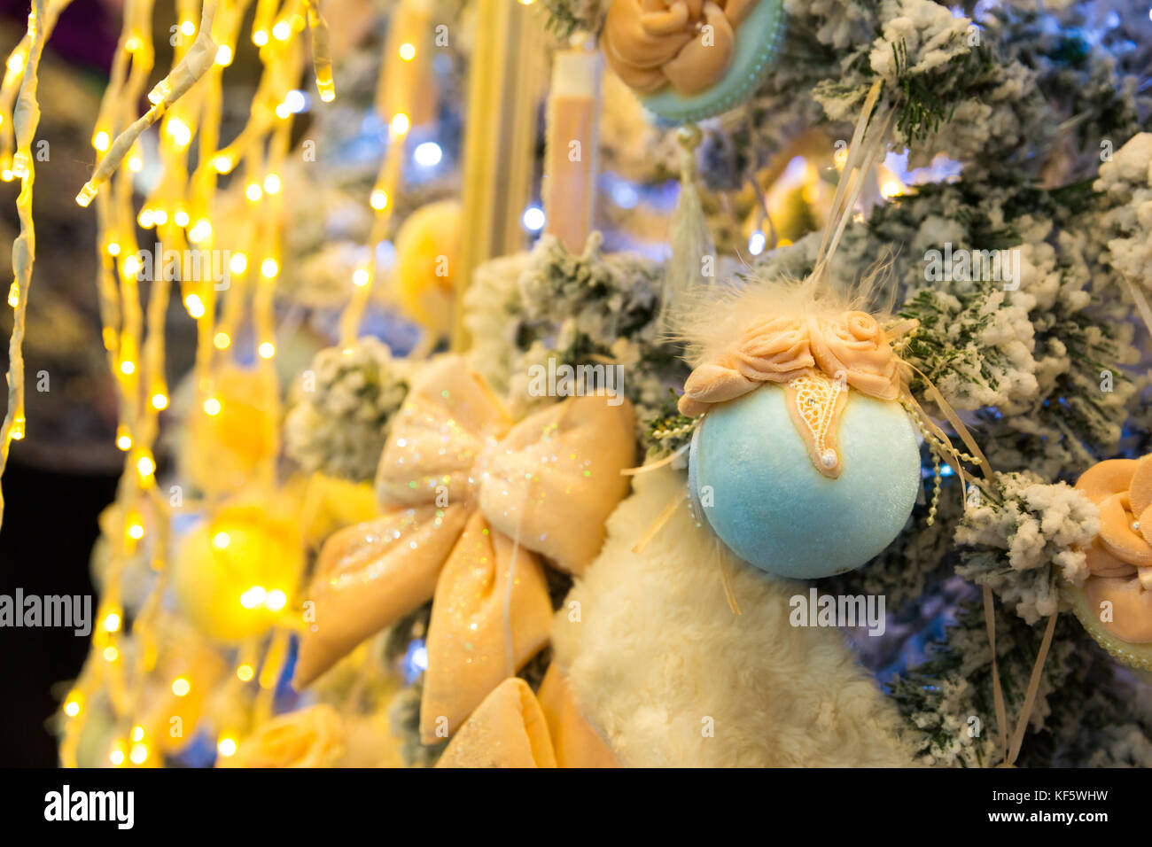 Christmas tree with blue balls and lights, garland Stock Photo - Alamy